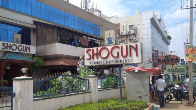 Time for Lunch [dopahara ke bojana ke]. We ate at Malgudi, which is in the middle but has the smallest sign.  And, in what is apparently old fashioned tradition, no TP in the loo. Just a hose with sprayer.