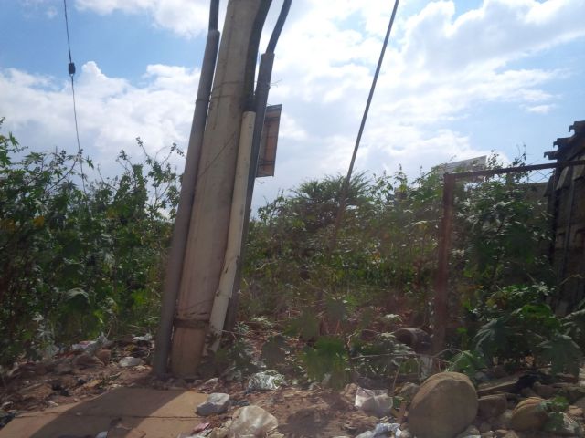 Not sure what to call this picture, but I saw images like this a lot.  It's not "dirty" as much as it is like where you'd yell at your kid - "Go clean up the back yard!"