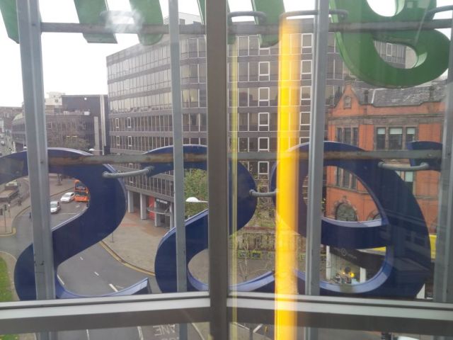 Holiday Inn Express sign, viewed from the back.