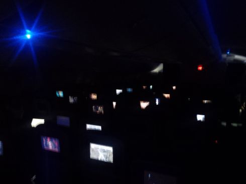 This is what numerous personal entertainment centers look like with all the plane lights dim.