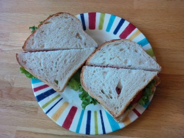 My tasty travel treat - Fakin' Bacon, Lettuce & Tomato sandwich.  I am a happy traveler.