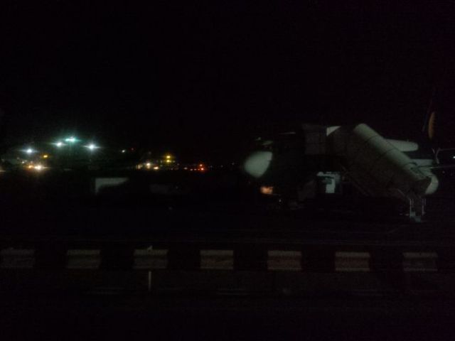 Apron boarding. Mumbai was very warm, too.  Hot air, tired me, and jet fuel exhaust. I really needed a shower.