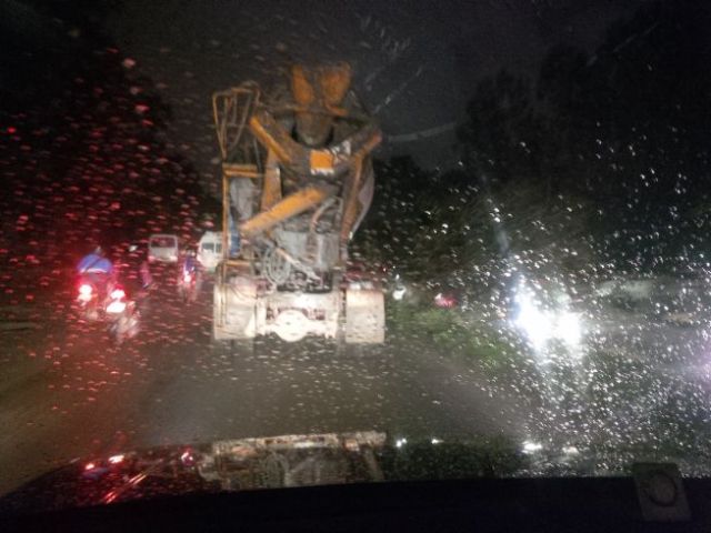 This is a cement truck that, if you blur your vision, almost looks like a temple statue.
