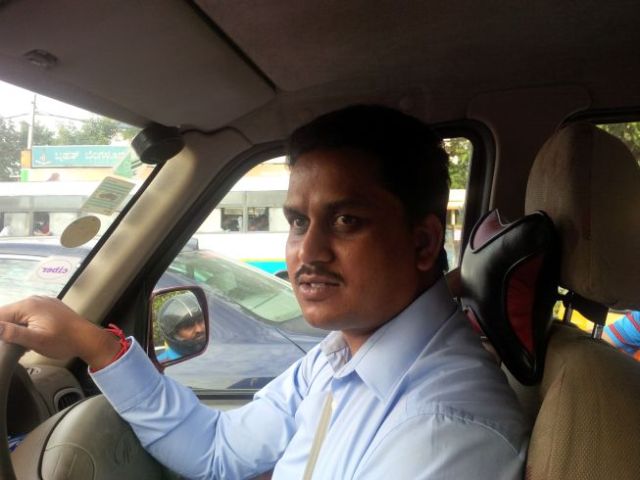 Neither Mohan nor the guy in the mirror seem to thrilled by this gridlock.