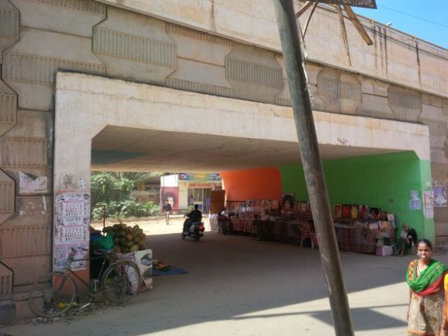 We visited the Ashram of Sri Sathya Sai. I couldn't take pictures inside of it, and I had to wear a cover over my lower half as I had a prohibited item - shorts!  The Ashram is across from this overpass.