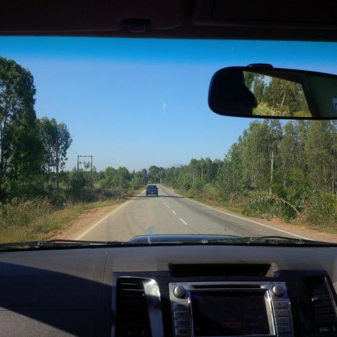 I think the peaks off in the distance are Nandi Hills.  Took lots of pics trying to capture these.