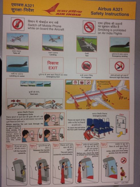 On board to Mumbai. Air India emergency info card. 