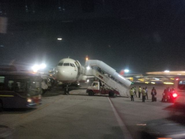 I'm okay skipping these apron boarding/deplaning methods. Jet-ways are much nicer.